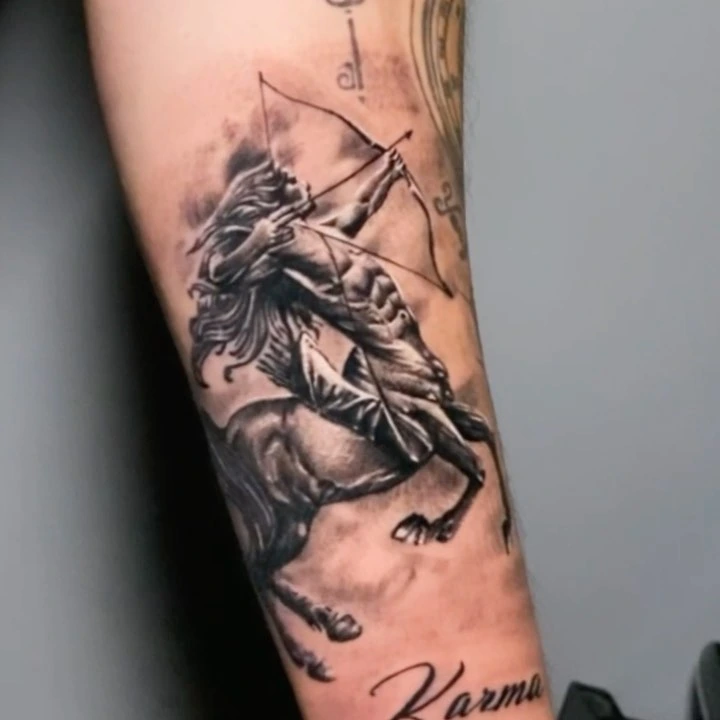 Sagittarius centaur archer with bow and 'Karma' lettering