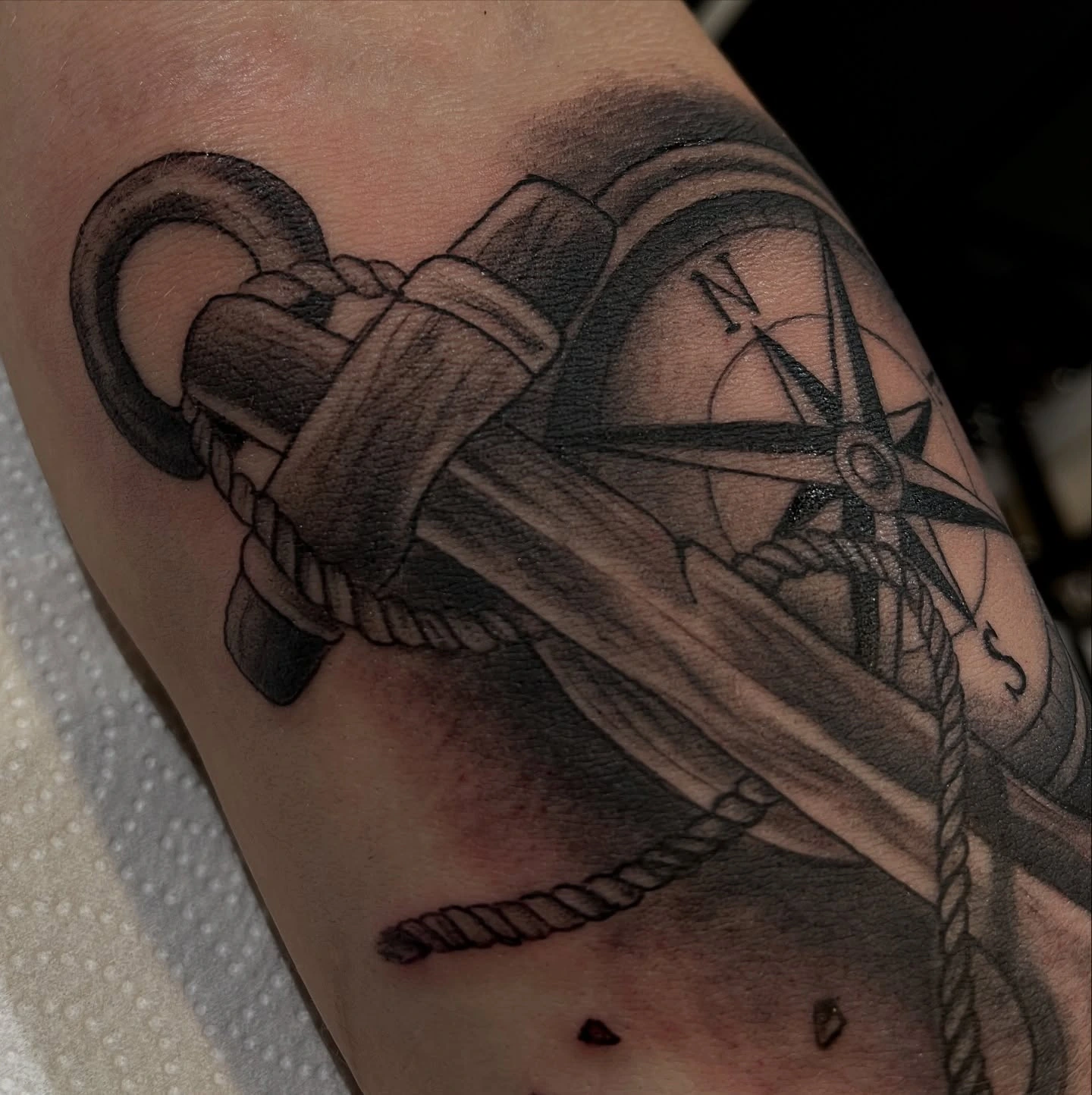 Anchor with rope and compass in sharp B&G realism