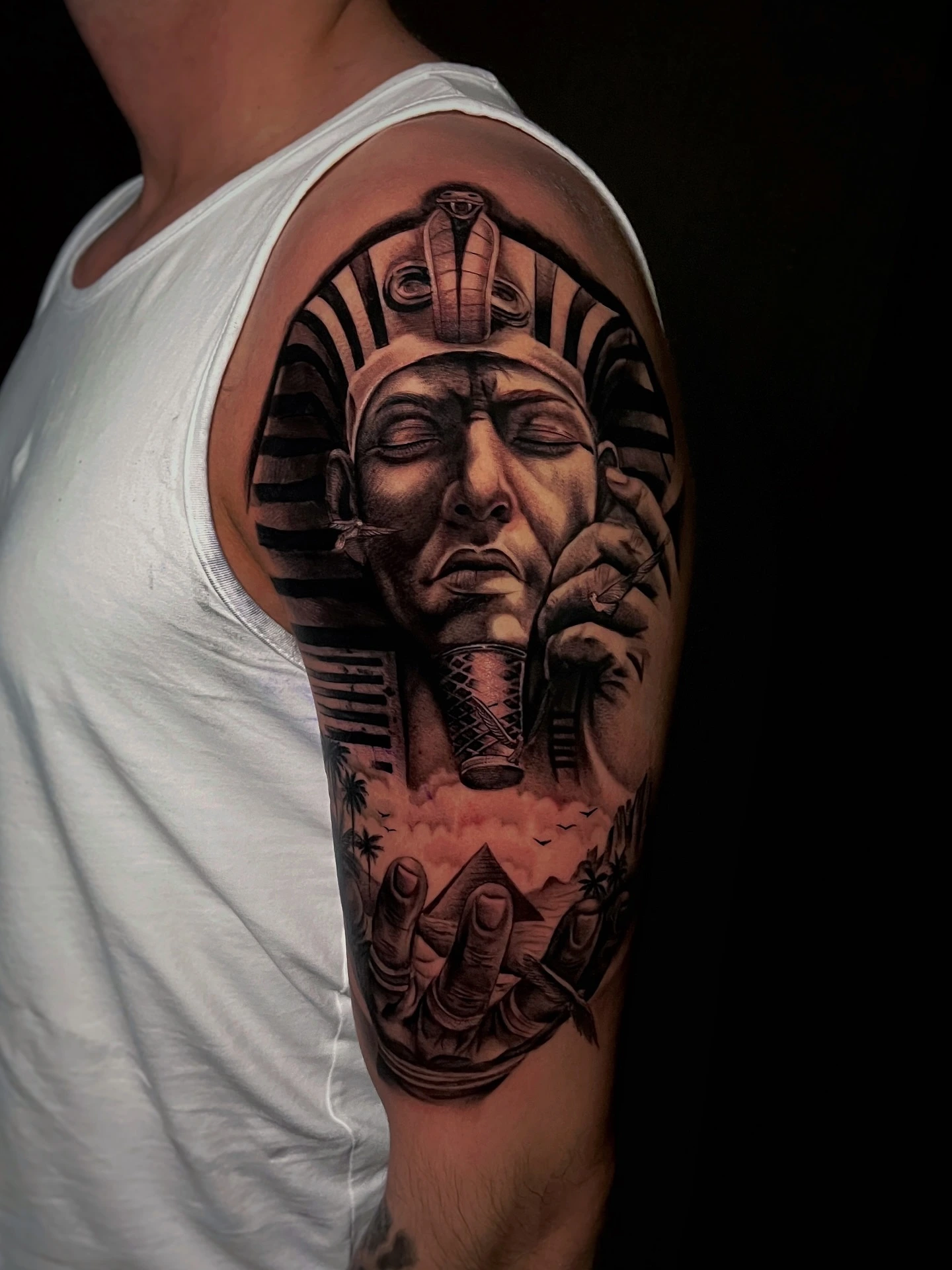 Pharaoh / Tutankhamun half sleeve — finished view with hand and pyramid scene