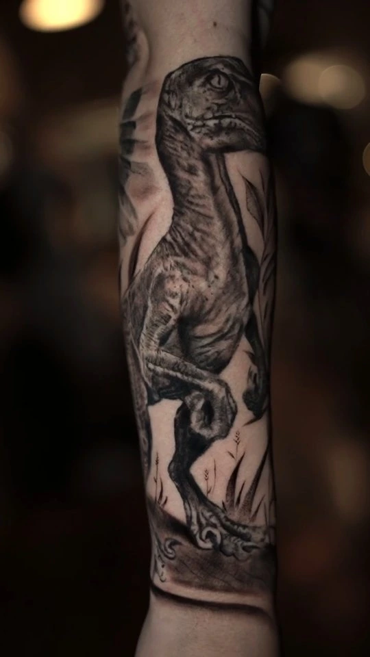 Velociraptor on forearm (alternate angle)