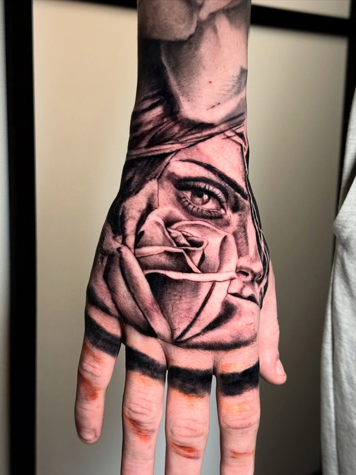 Photoreal black rose on hand