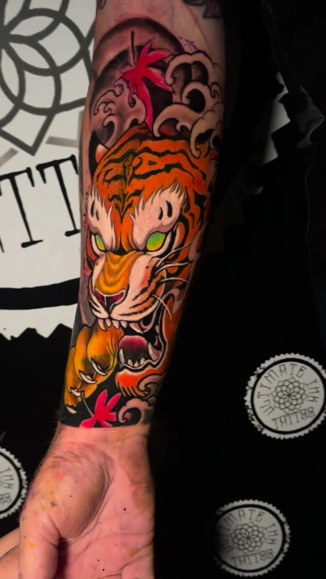 Orange/yellow tiger with maple leaves and Japanese waves, neo-traditional