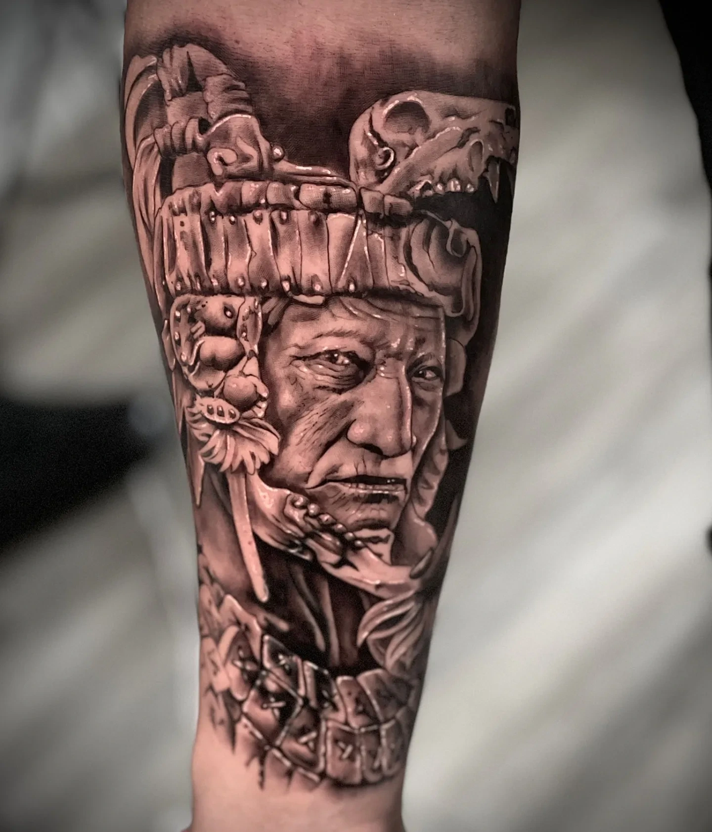 Mayan/Aztec elder warrior portrait with skull/feathered headdress
