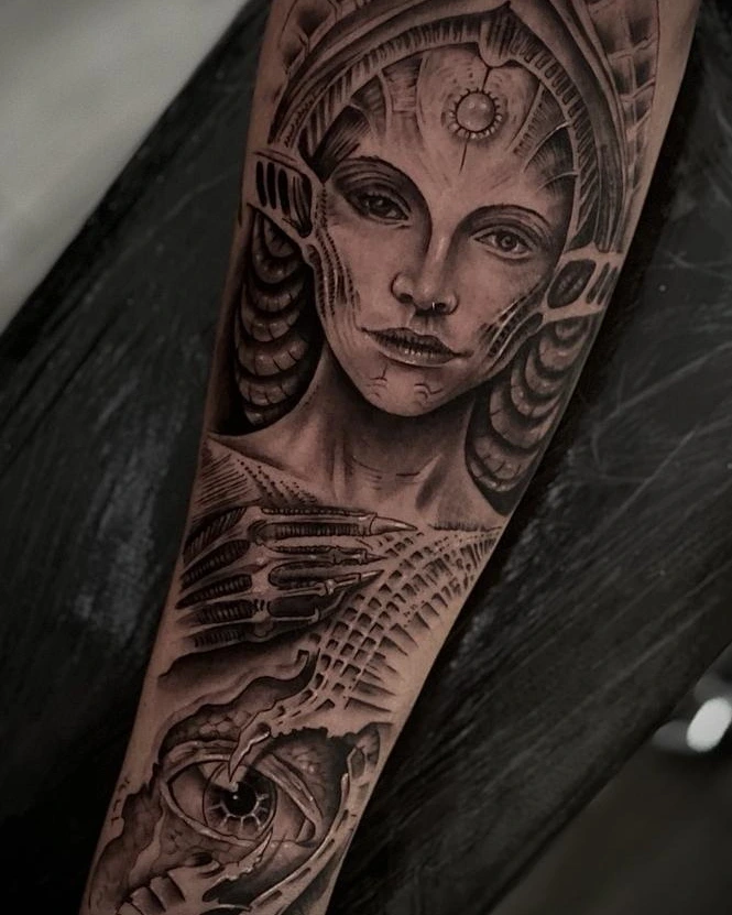 biomechanical/H.R. Giger-style alien woman with skeletal hand and eye
