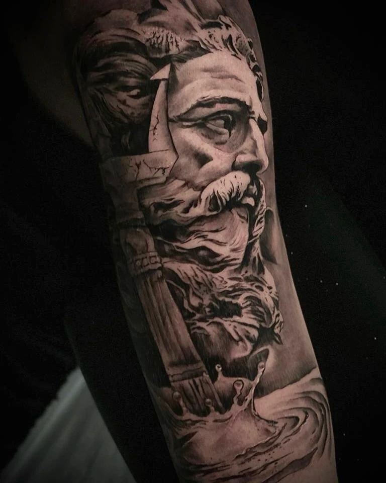 Poseidon/Zeus statue head with flowing beard and water splash